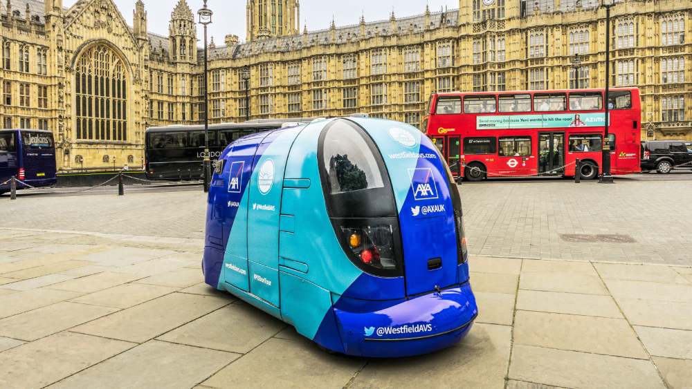 Driverless car parked outside Houses of Parliament