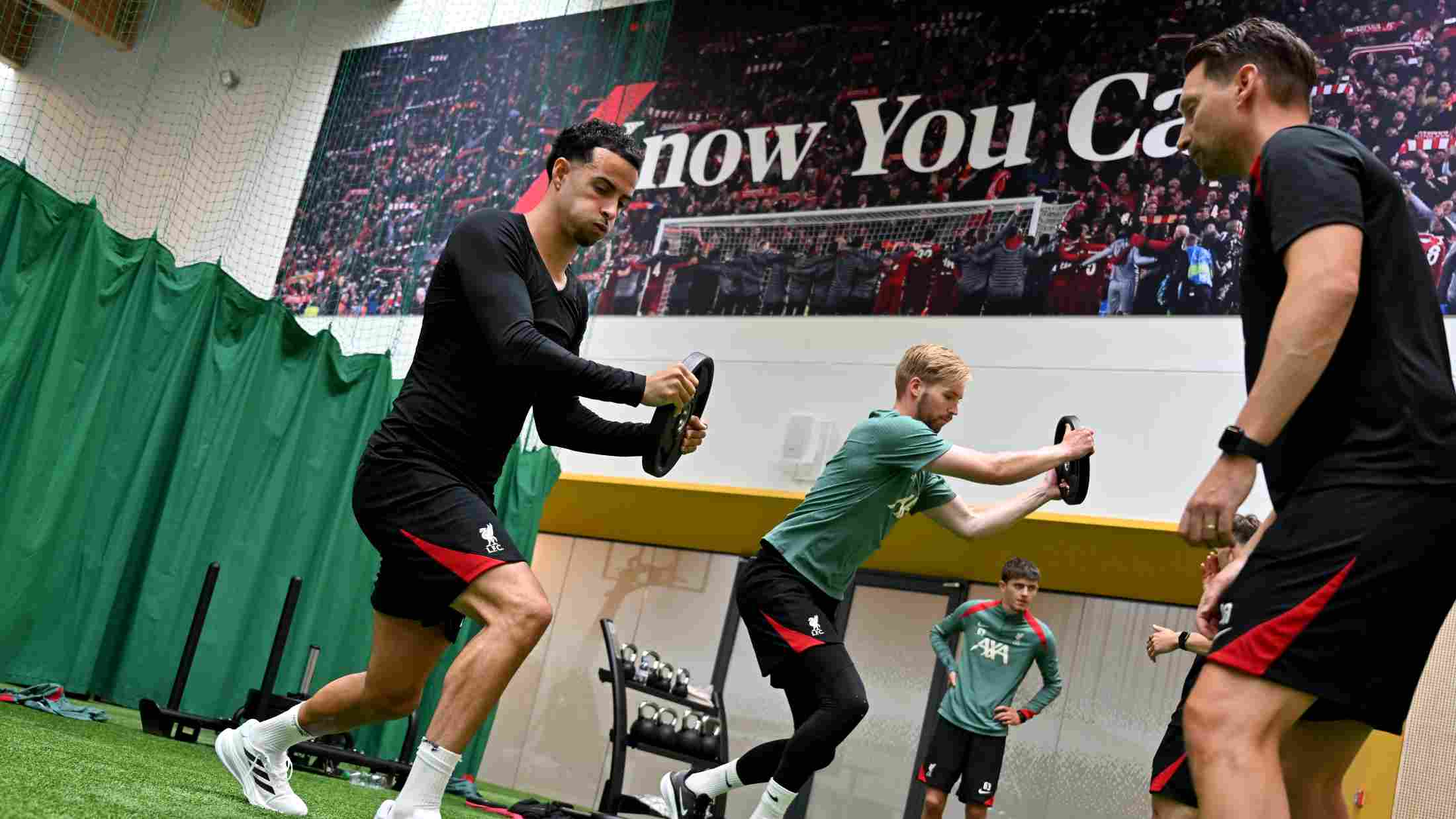 physical training in a gym room with know you can banner in 2018