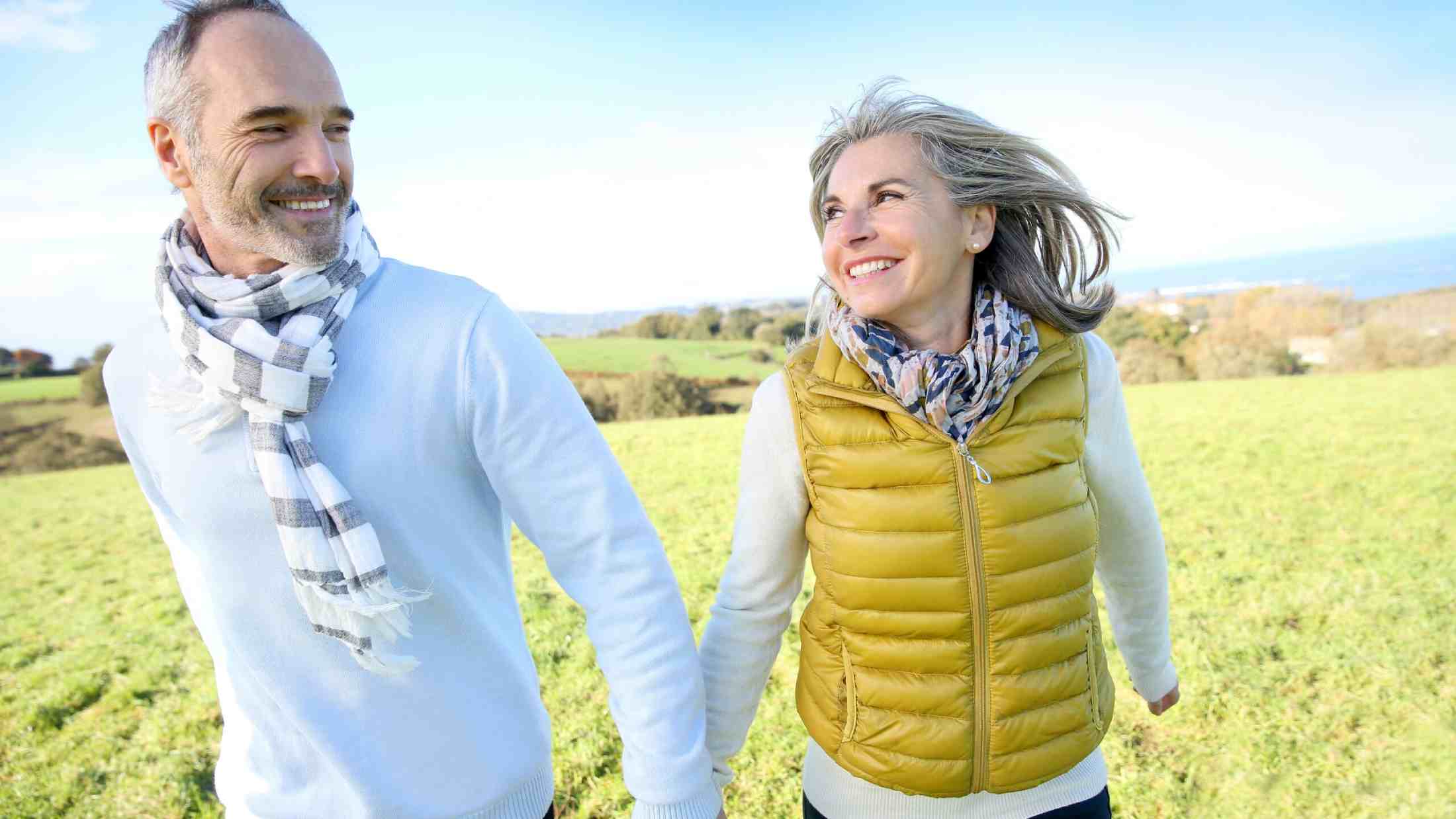 Couple walking in countryside